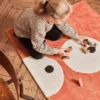 Tapis enfant en coton bio Zoeils - terracotta - Bleuu Studio | Manoir Plume Tapis enfant en coton bio Zoeils - terracotta - Bleuu Studio | Manoir Plume
