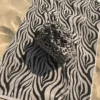 Serviette de plage en coton bio - zèbre - Atelier Dune | Manoir Plume