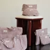 Pouf en bouclette et placage de frêne Lazare - bordeaux et crème - Gabrielle Paris | Manoir Plume